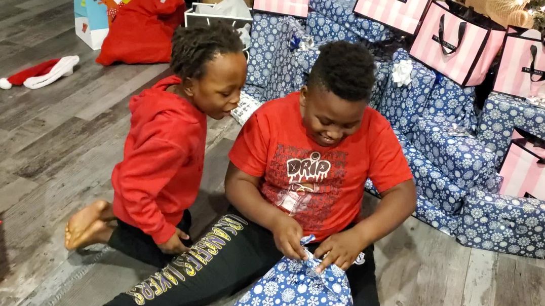 ⁣Opening Christmas presents with J Funk and Josiah