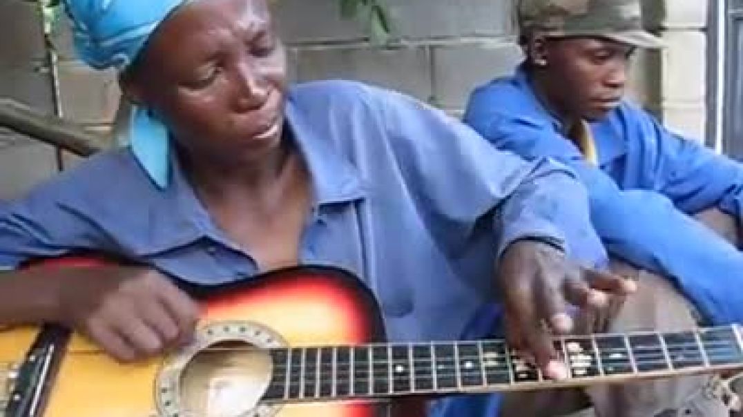 4 STRING GUITAR ADAPTED BY THE BATSWANA PEOPLE OF BOTWANA