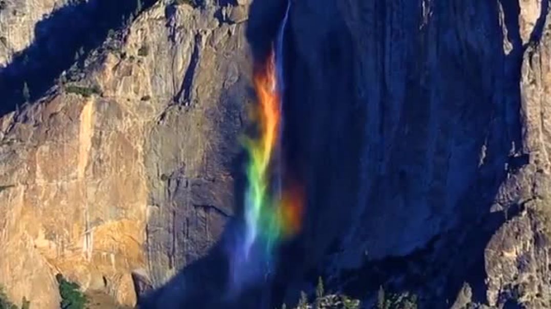 ⁣Breathtaking 2,400-foot rainbow waterfall in Yosemite National Park