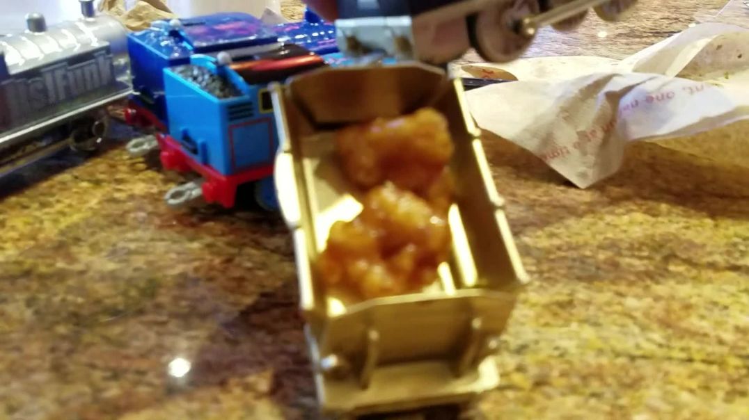 ⁣itsjfunk gives his Thomas and friends toy trains orange chicken