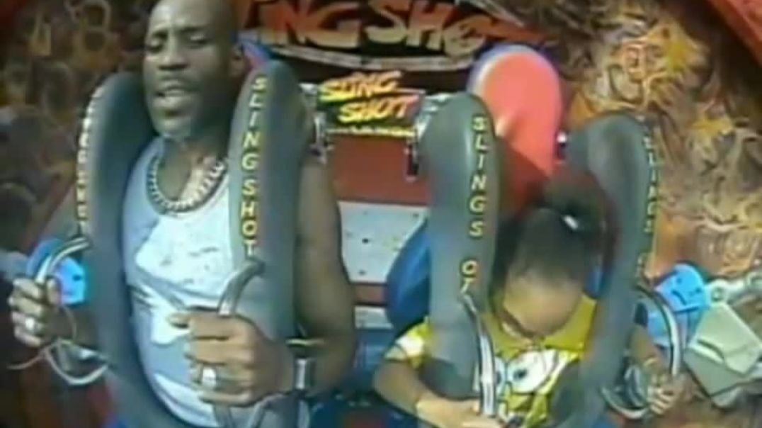 ⁣Dmx encourages his daughter on rollercoaster ride