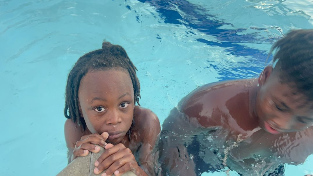 ⁣Swimming with JFunk and Miracle Baby Josiah
